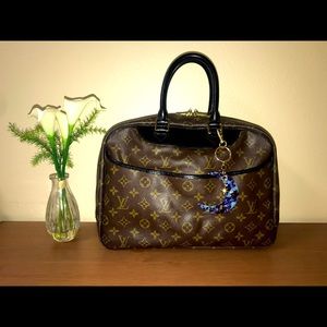 Louis Vuitton Deauville custom leathers in black.